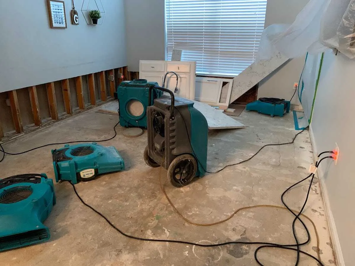 Dehumidifier in flood-cut room for Water Damage Restoration in Nederland